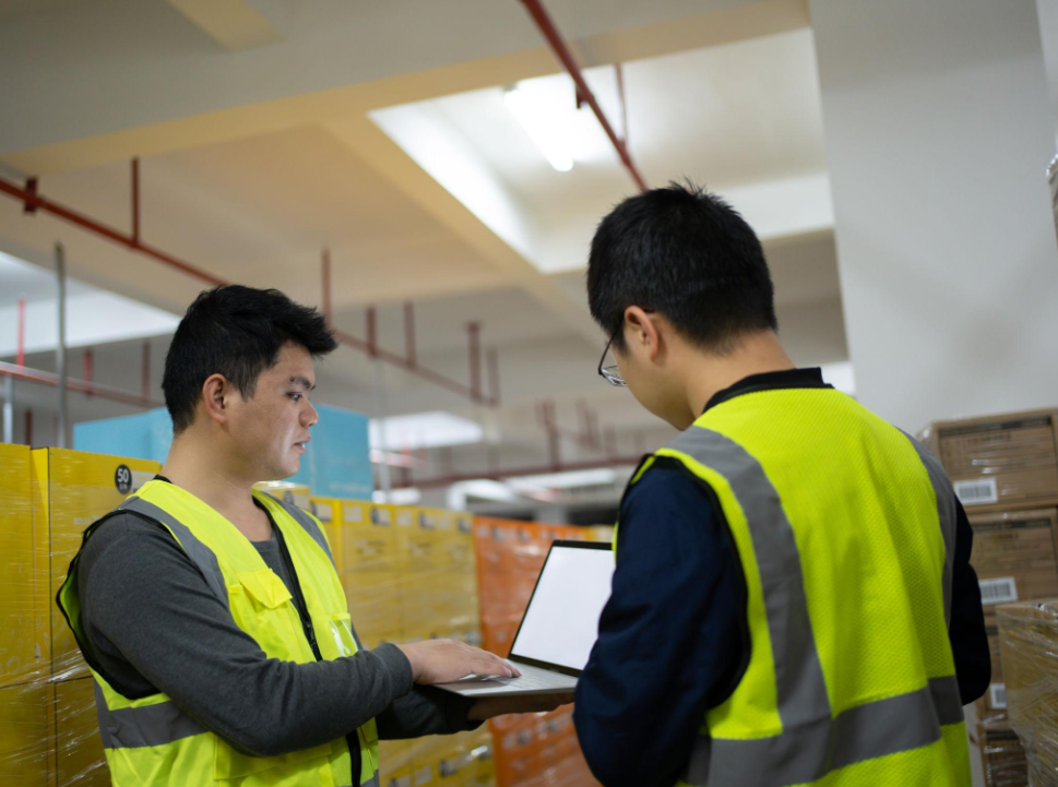 Staff coordinating global shipping and supply chain